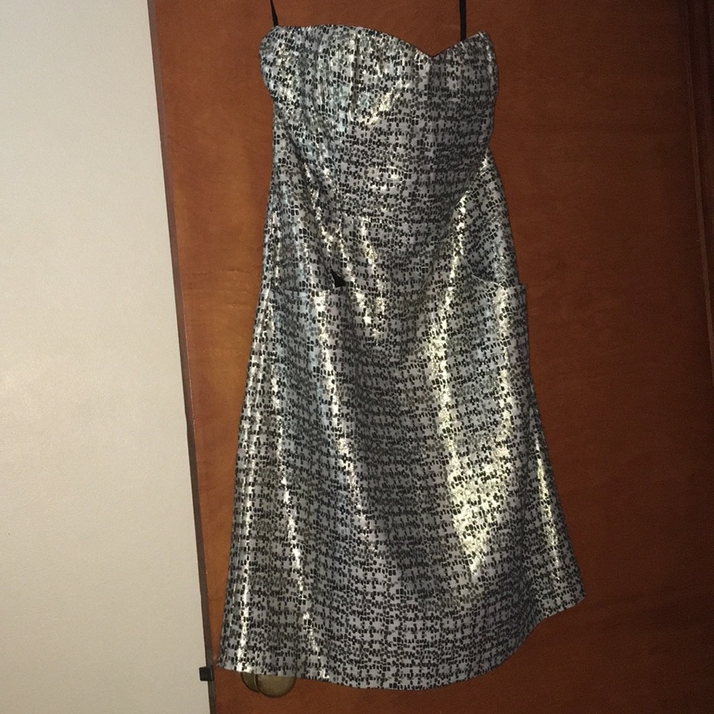 Gold and black strapless dress with pockets